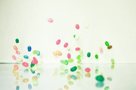 Macro of medicine falling Stock Photos