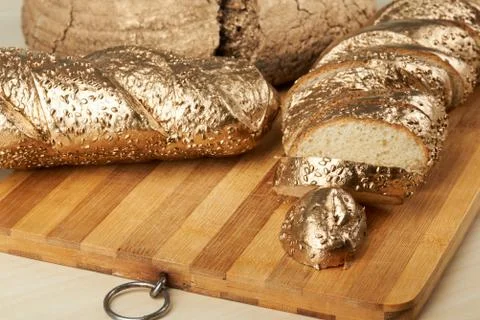 Macro of metallic gold bread Stock Photos