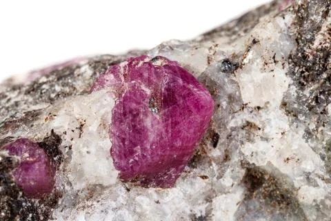 Macro of a mineral Ruby stone on a white background Stock Photos