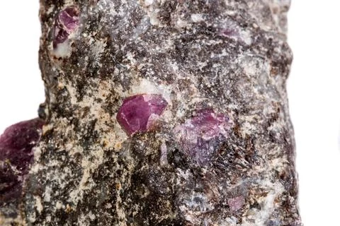 Macro of a mineral Ruby stone on a white background Stockfoto's