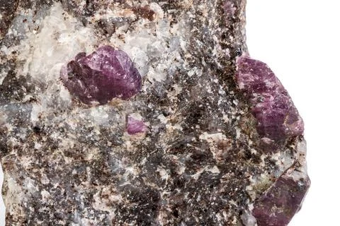 Macro of a mineral Ruby stone on a white background Stock Photos