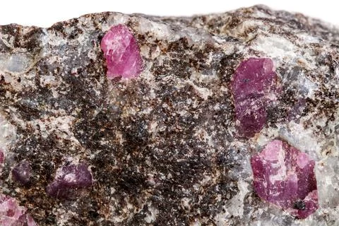 Macro of a mineral Ruby stone on a white background Stock Photos