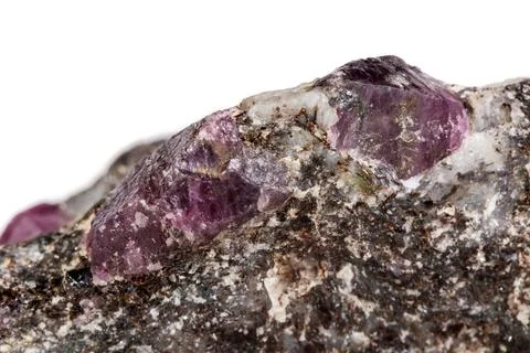 Macro of a mineral Ruby stone on a white background Stock Photos