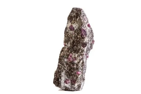 Macro of a mineral Ruby stone on a white background Stock Photos
