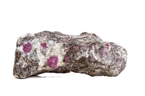 Macro of a mineral Ruby stone on a white background Stock Photos
