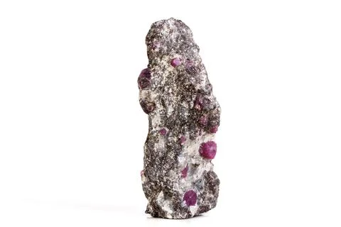 Macro of a mineral Ruby stone on a white background Stock Photos