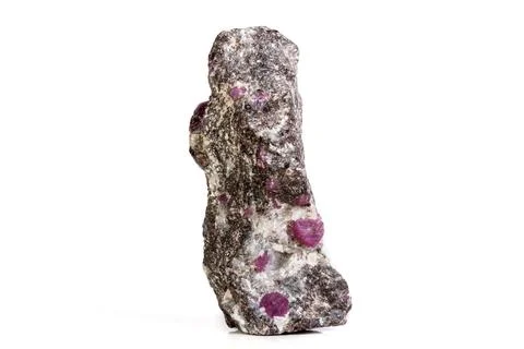 Macro of a mineral Ruby stone on a white background Stock Photos