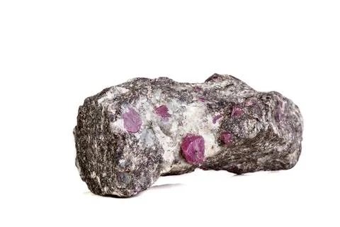 Macro of a mineral Ruby stone on a white background Stock Photos