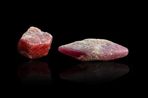 Macro mineral stone ruby on a black background background Stock Photos