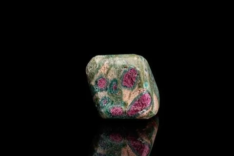 Macro mineral stone ruby black background Stockfoto's
