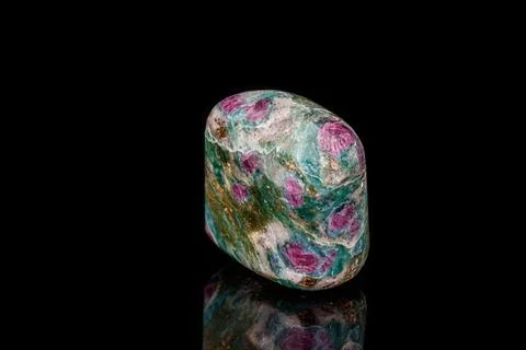 Macro mineral stone ruby black background 스톡 사진