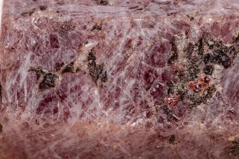 Macro mineral stone Ruby in the breed a white background Foto stock