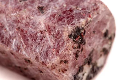 Macro mineral stone Ruby in the breed a white background Stock Photos