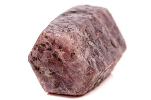 Macro mineral stone Ruby in the breed a white background Stock Photos