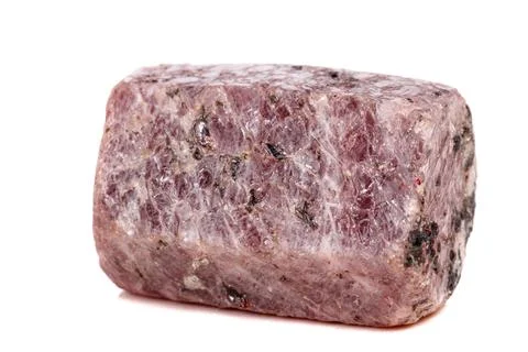 Macro mineral stone Ruby in the breed a white background Stock Photos