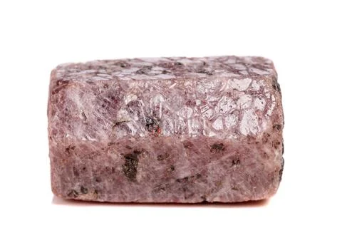 Macro mineral stone Ruby in the breed a white background Stock Photos