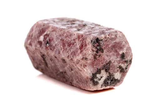 Macro mineral stone Ruby in the breed a white background Stock Photos