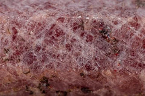 Macro mineral stone Ruby in the breed a white background Stock Photos