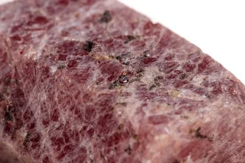 Macro mineral stone Ruby in the breed a white background Stock Photos