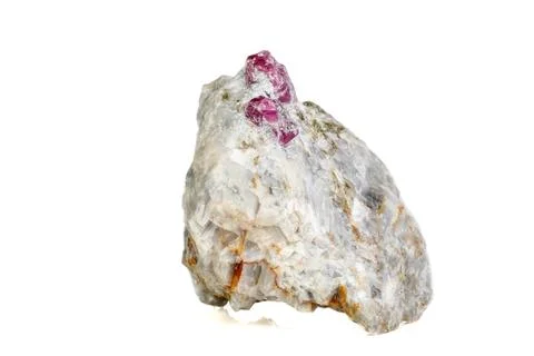 Macro mineral stone Ruby in rock on white background Stock Photos