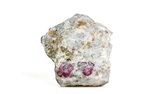 Macro mineral stone Ruby in rock on white background 스톡 사진