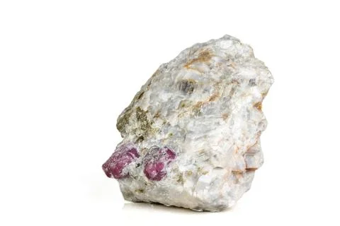 Macro mineral stone Ruby in rock on white background Stock Photos