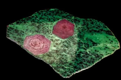 Macro of mineral stone ruby in rock on black background 写真素材