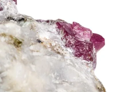 Macro mineral stone Ruby in rock on white background Stock Photos