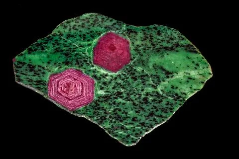Macro of mineral stone ruby in rock on black background 写真素材