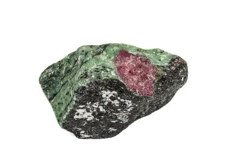 Macro of mineral stone ruby in rock on white background Stock Photos