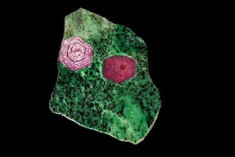 Macro of mineral stone ruby in rock on black background Foto stock