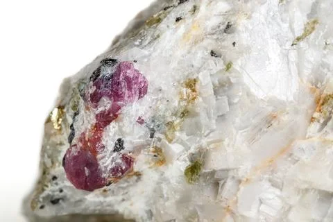 Macro mineral stone Ruby in rock on white background Stock Photos