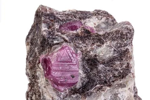 Macro mineral stone ruby on a white background Stock Photos