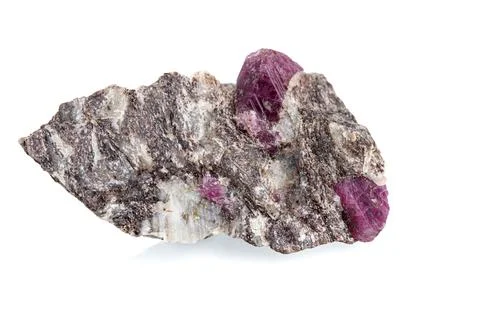 Macro mineral stone ruby on a white background Stock Photos