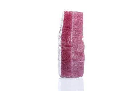 Macro mineral stone ruby on a white background Stock Photos