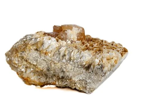 Macro mineral stone  Scheelite on a white background Stock Photos