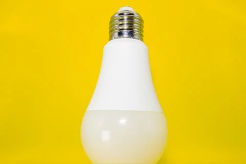 Macro Modern LED lamp, saving electricity. Tungsten light bulb lamp close-up. Stock Photos