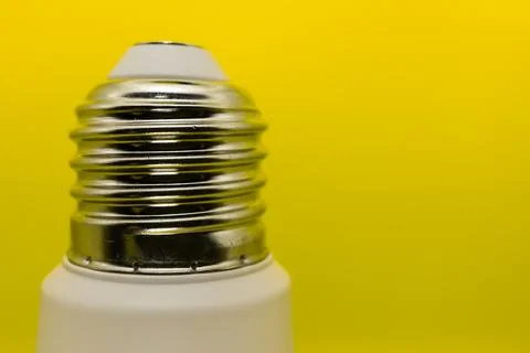 Macro Modern LED lamp, saving electricity. Tungsten light bulb lamp close-up. Фото