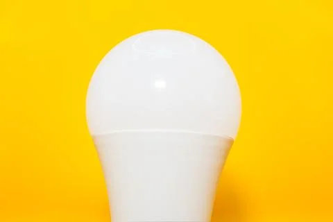 Macro Modern LED lamp, saving electricity. Tungsten light bulb lamp close-up. Stock Photos