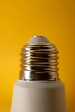 Macro Modern LED lamp, saving electricity. Tungsten light bulb lamp close-up. Stock Photos