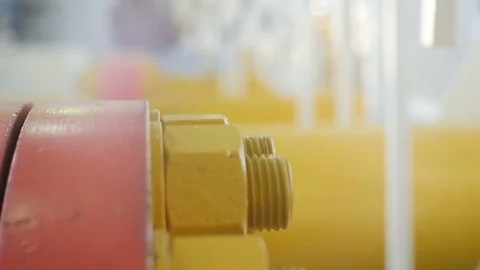 Macro Motion by Metal Red Yellow Detail with Bolts Nuts 库存影片 73142132