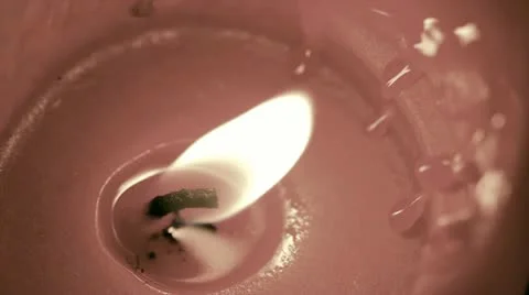A Macro of a Neutral Colored Candle Flame Stock Footage 10946115