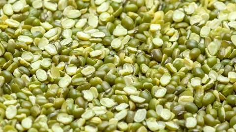Macro of nutritious green mung beans being scooped up, 4K Stock Footage 68457436