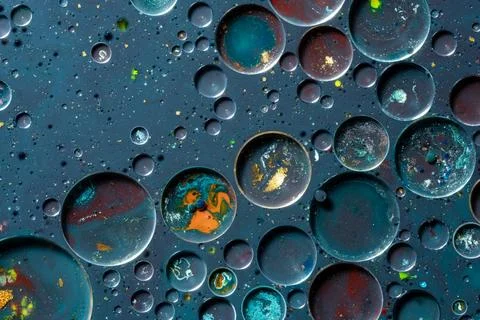Macro Oil Bubble Texture Background with Floating Circular Patterns Stock Photos