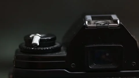 Macro of an old analog photo camera, shutter button and viewfinder Stock Footage 281098120
