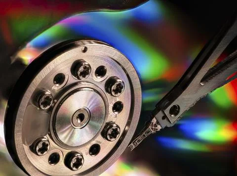 Macro of an open computer hard drive with the read write head Foto stock