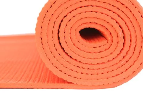 Macro Orange mat for Yoga isolate on white background Stock Photos