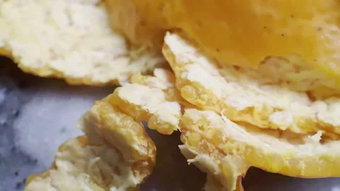 Macro Orange Peel Texture on Ceramic Plate with Natural Lighting Video stock 333096282