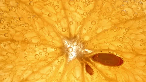 Macro orange texture with bubbles in sparkling drink background Stock Footage 331260051