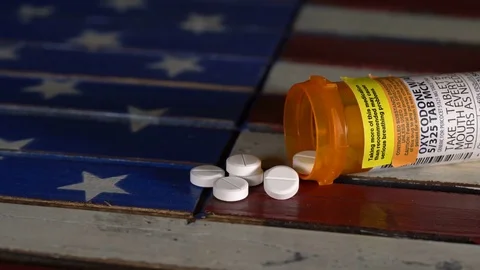 Macro of oxycodone opioid tablets Stock-Footage 83944352